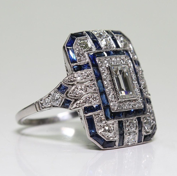 Vintage gepolijste zilveren en blauwe zirkoon ring